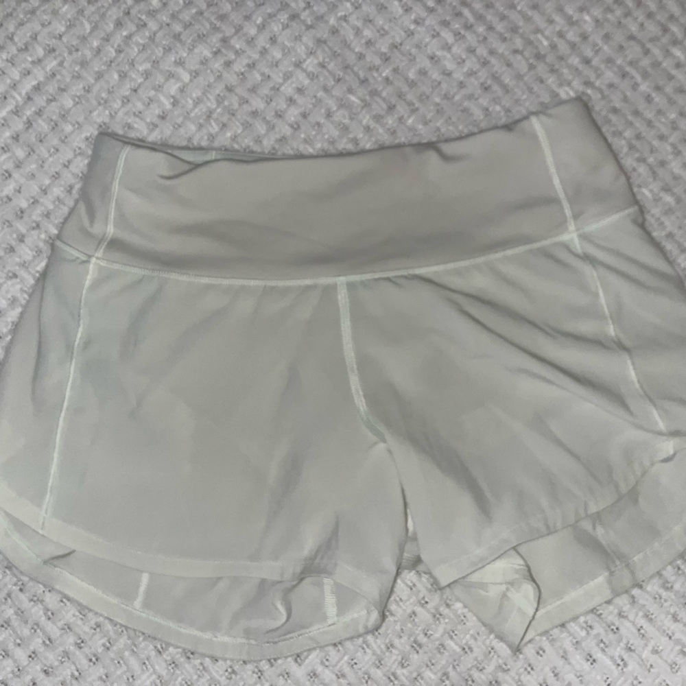 Speed up mid- rise lined shorts 4”